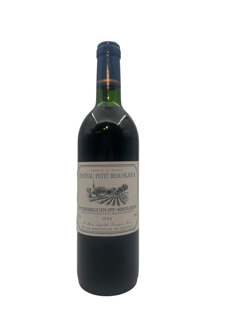Bouteille de Château Petit Beauséjour Puisseguin St-Emilion de 1990