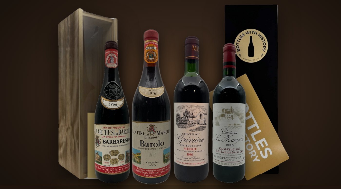Jahrgangsweine von 1966, 1976, 1986 und 1996 vor Geschenkboxen von Bottles With History aus Holz und in Schwarz